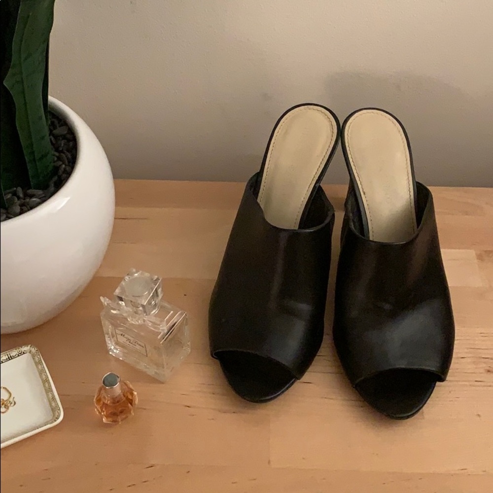 Black leather Franco Sarto mules